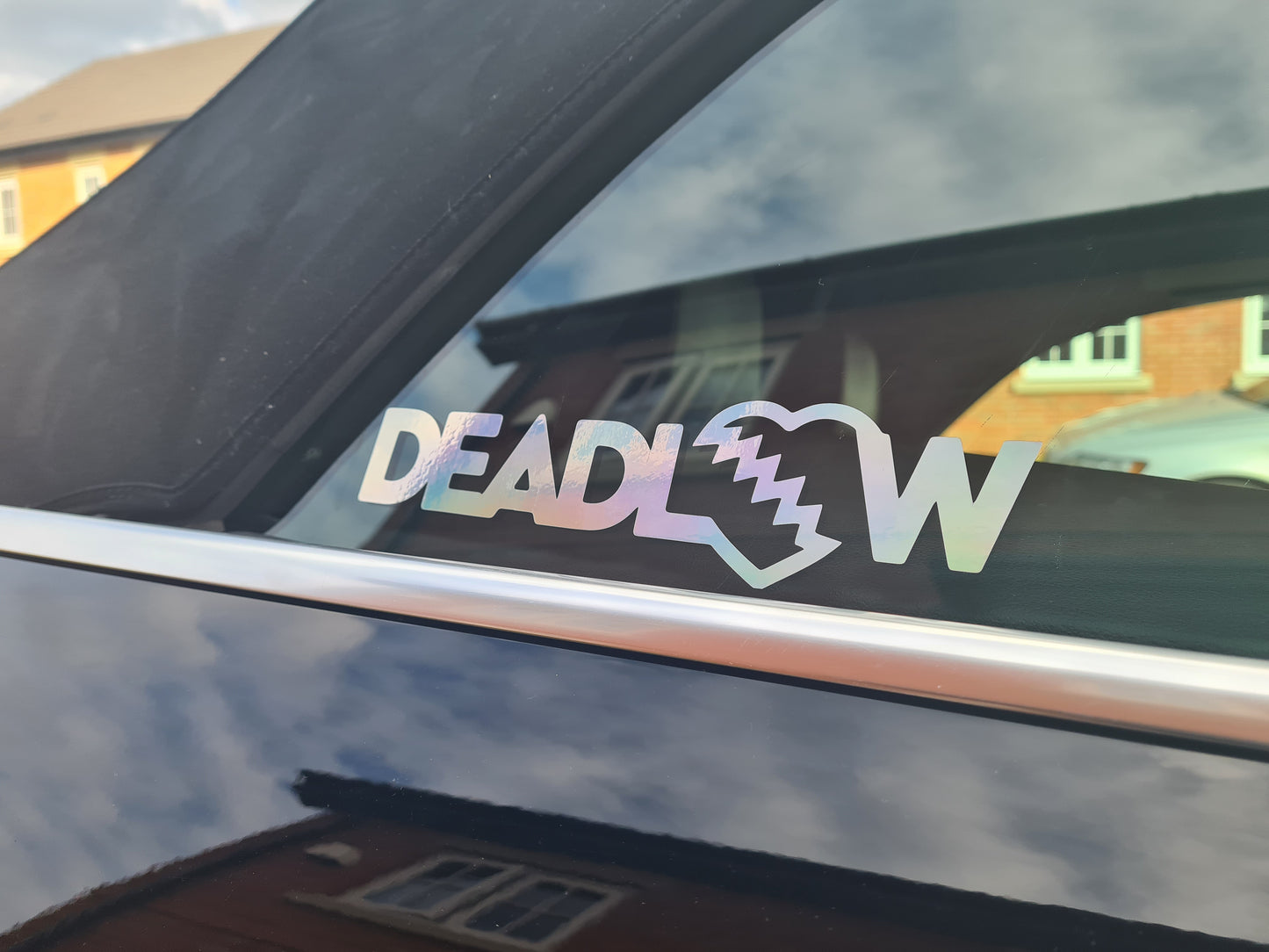 Breaking hearts window decal