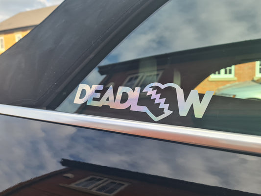 Breaking hearts window decal